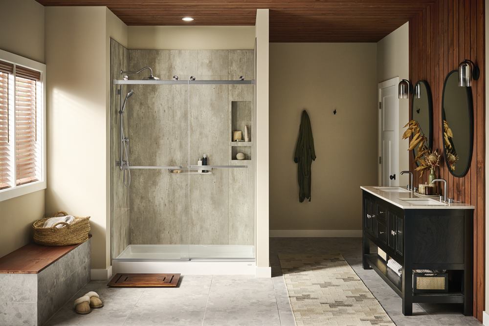 Walk-in shower with a low step-in, handheld shower wand, and weathered farm-style walls