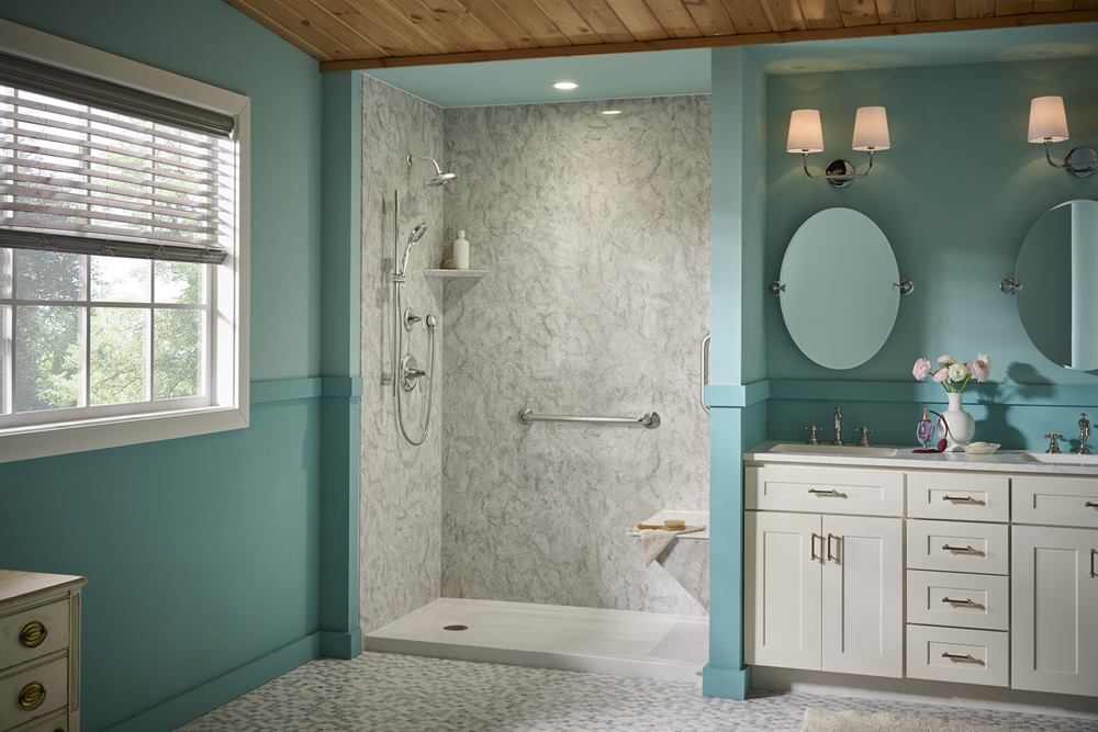 Walk-in shower with Champagne Travertine walls, grab bars, and built-in corner seat